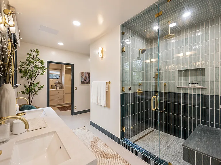Experience ultimate comfort with heated floors and premium amenities in the renovated master bath.
