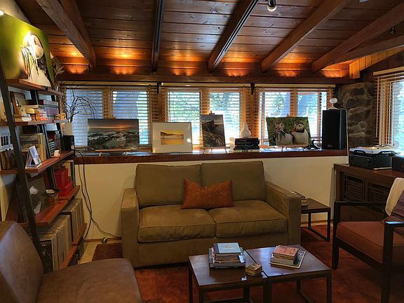 LR up lighting and open beam ceiling