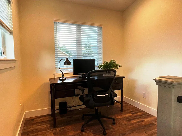 Office with desk and lamp included