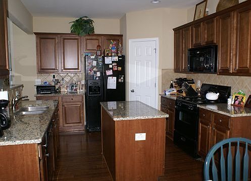 Kitchen with island and granite