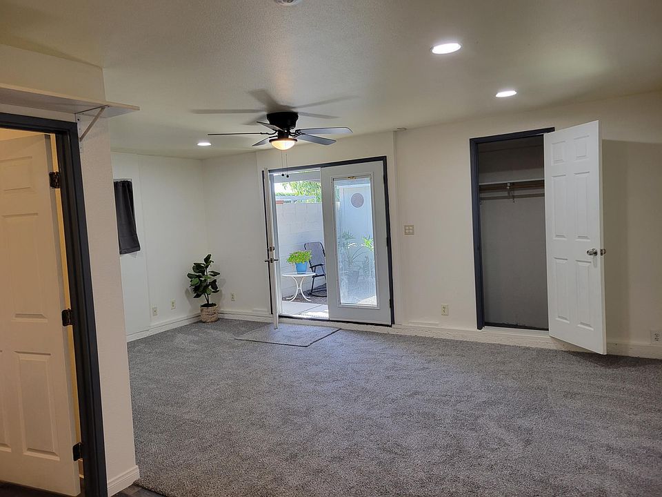 main room and front door, closet on right side.
