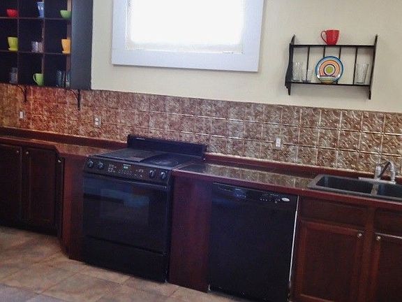 Open upper kitchen cabinets 