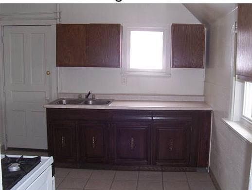 Kitchen with back door on the left to Ellie/back entrance.