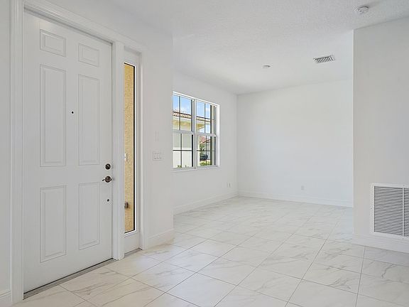 4th image of 24050 SW Firenze Way