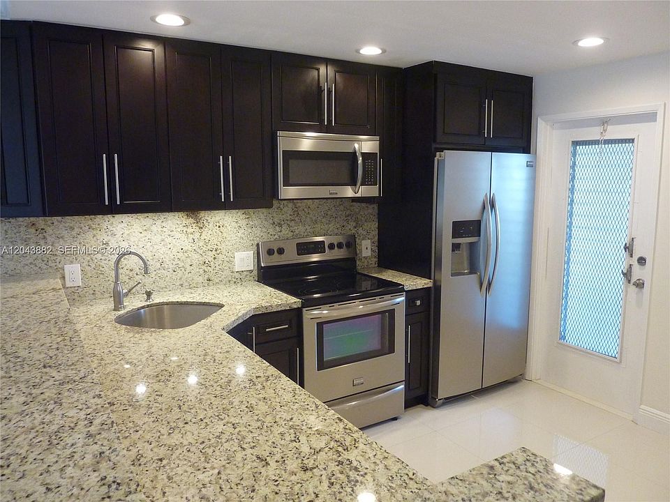 1st image of 3200 N Palm Aire Dr APT 305