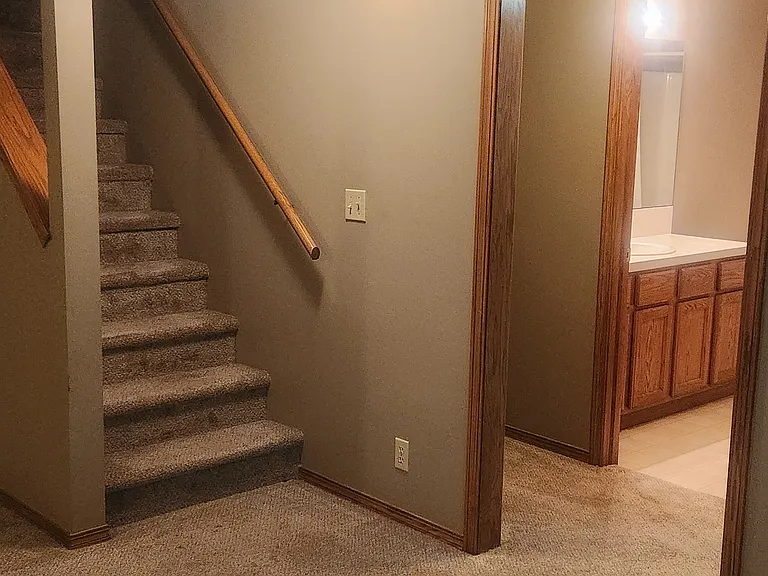 stairs in basement rec room
