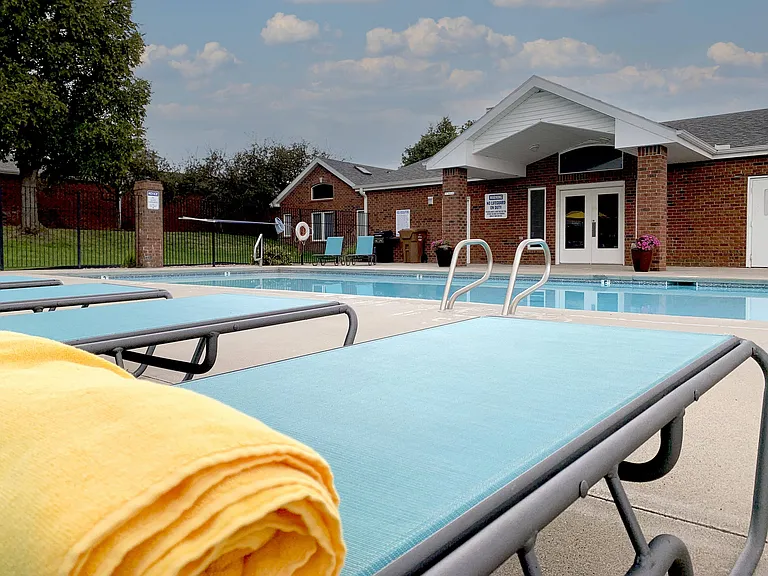 "Kick back and relaxyour resort-style pool with lounge seating is the perfect spot to soak up the sun or cool off on a warm day.