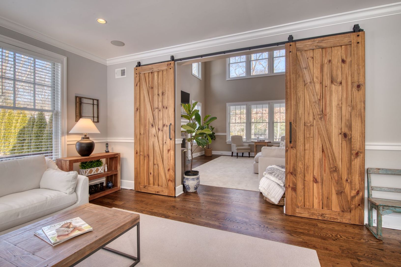  barn doors between two living rooms