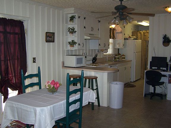 Kitchen & Dining area has brand new Counter tops and Floor