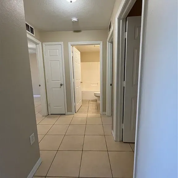 split floor plan- this side has all guest bedroom and 1 bathroom