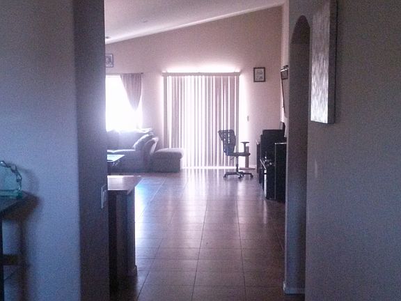 Hallway from den to kitchen/living area