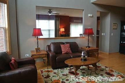 Living Room
						:
						Wooden blinds, hardwood floors