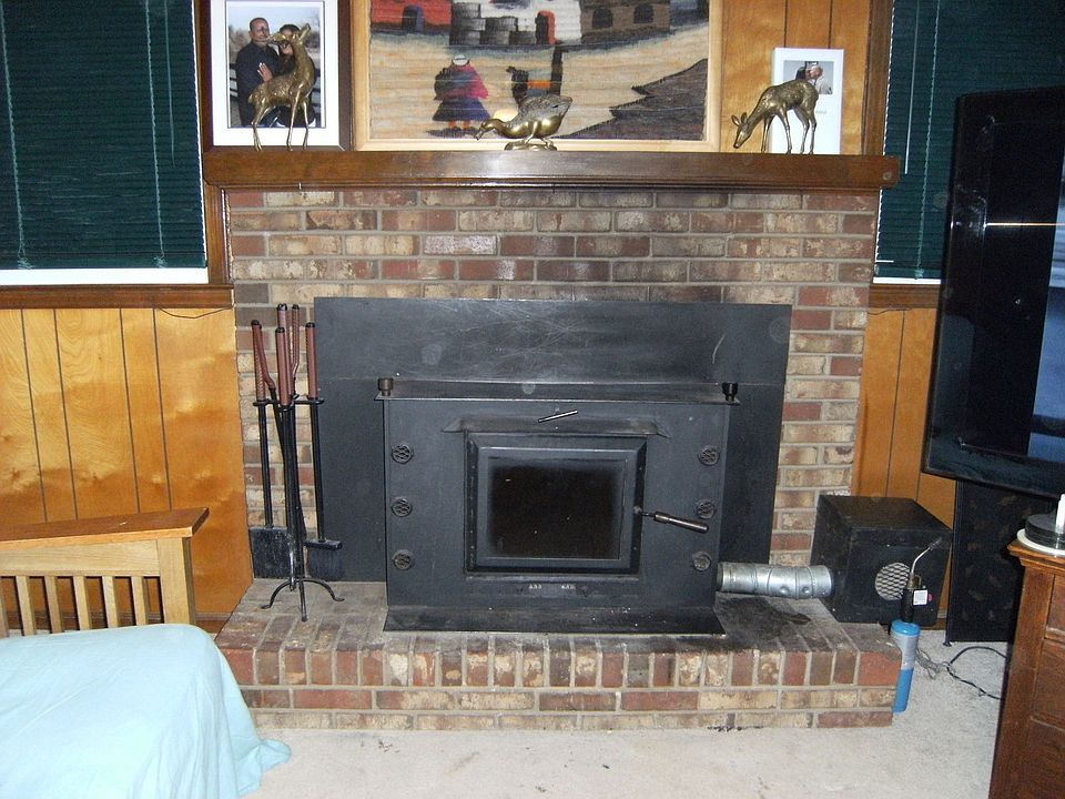 Wood burning fireplace in den for those cold nights!