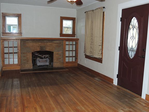 Living Room with Decorative Fireplace