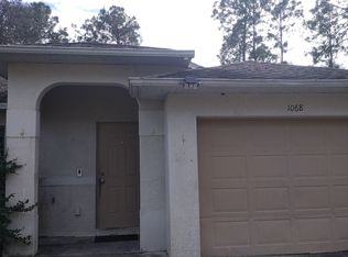 1068 Ainsworth St E, Lehigh Acres, FL 33974