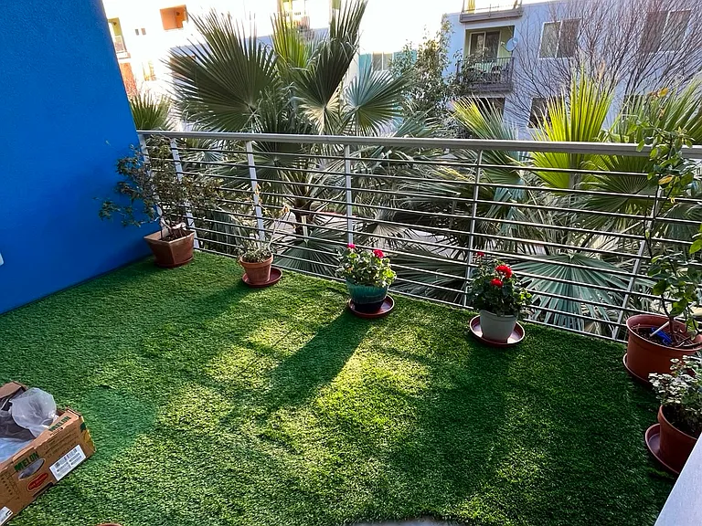 Artificial turf on upper and lower patio