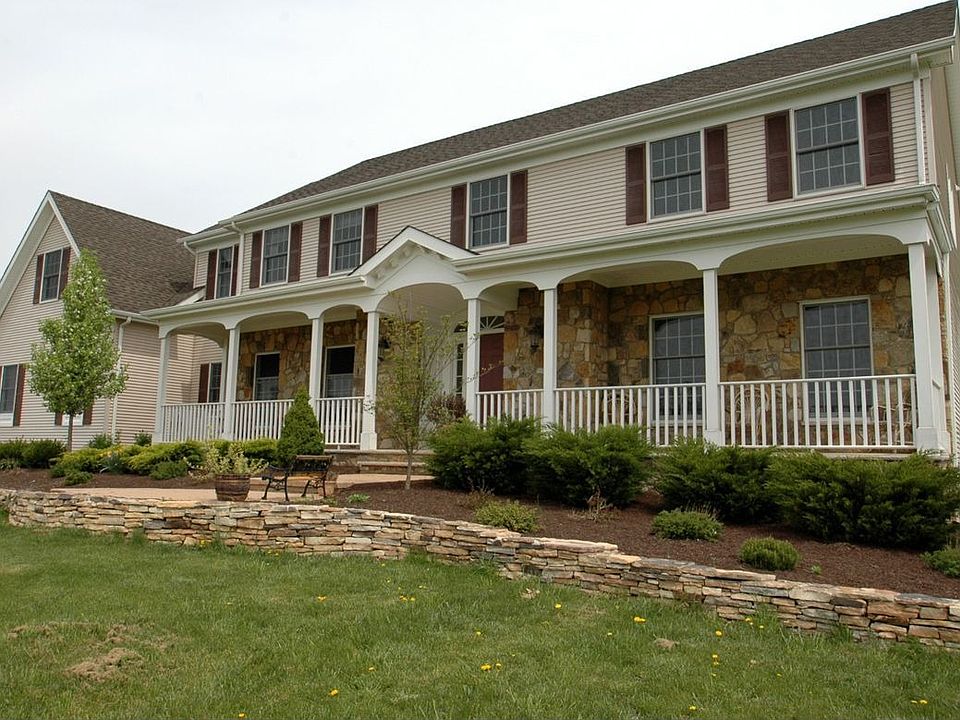 Front of Home - stone vinyl and covered porch