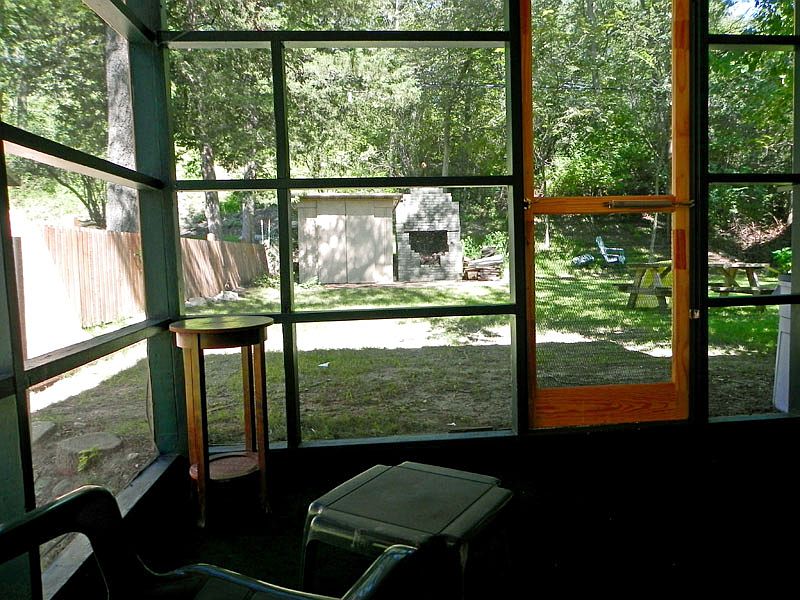 Rear screened porch + yard