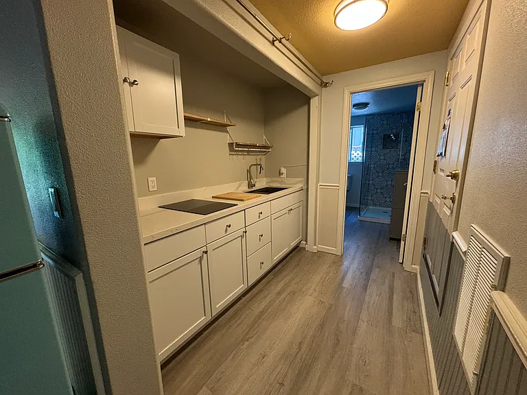 kitchen into bathroom