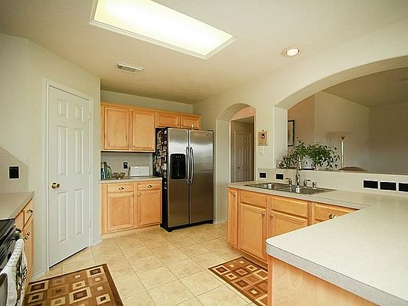 Stainless appliances.  Open to the den!