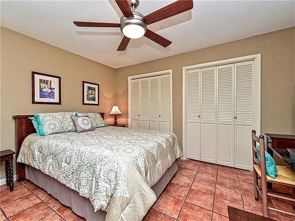 Inviting master has two closets and nook for desk / home office area.