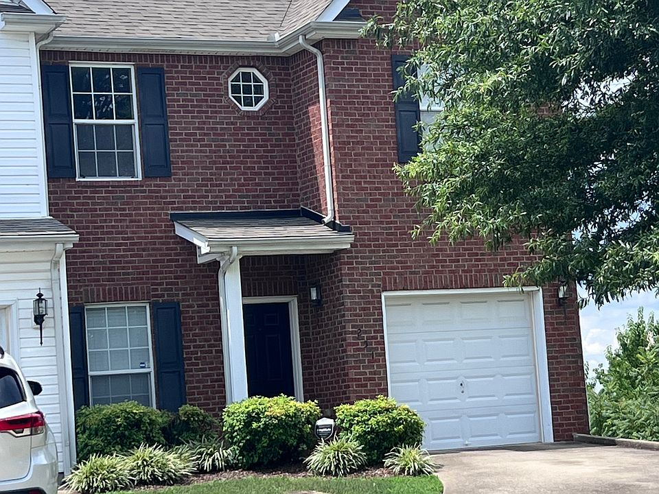 Quaint townhome with amazing view of the surrounding area. One car garage and room to park 2 additional cars on driveway.