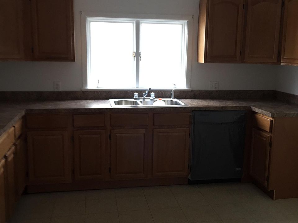 new kitchen with stove, dishwasher