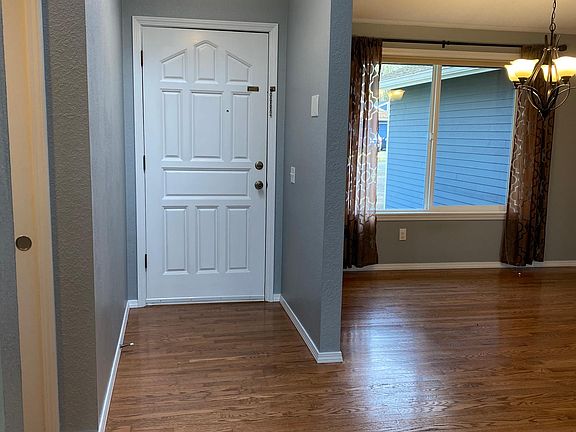 Looking into entry and dining room to the right