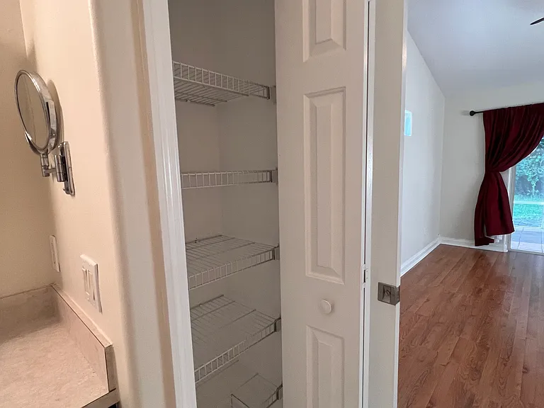linen closet in en suite bathroom