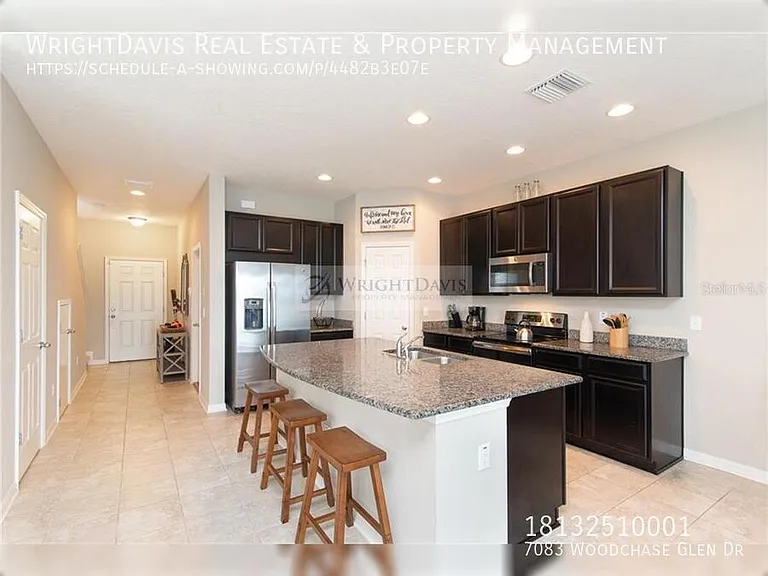 7083 Woodchase Glen Dr — Photo 3