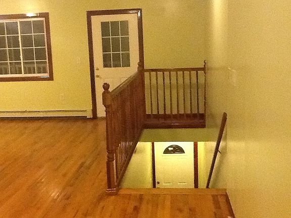 living room with stairwell