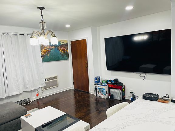 ANOTHER VIEW OF LIVING ROOM LARGE WALL SPACE