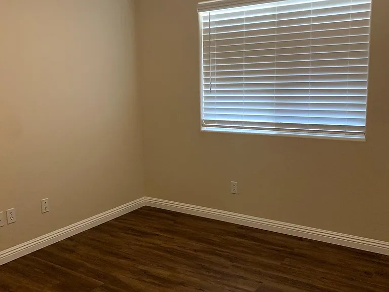 Guest bedroom 2. New paint & baseboards and luxury vinyl plank flooring.