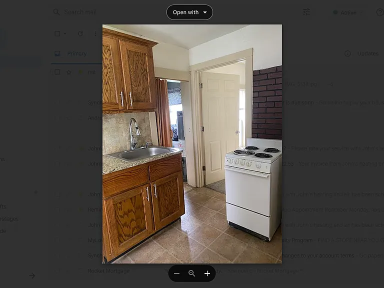 Kitchen includes custom cabinets and stove. Also large pantry.