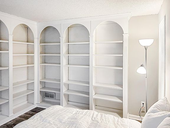 Floor to ceiling built in shelving