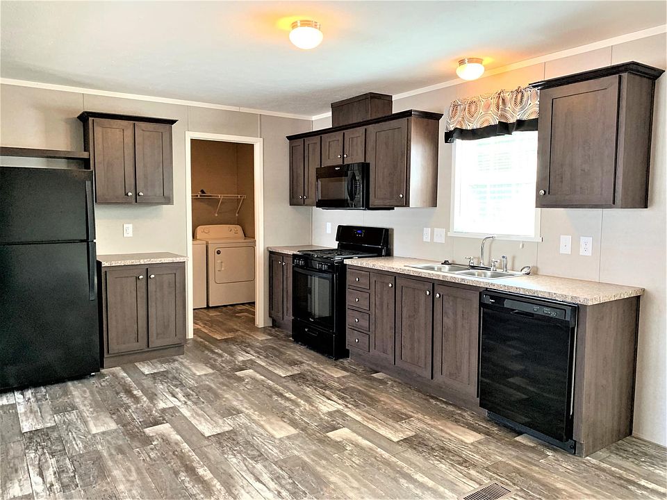 Open floor plan with country kitchen