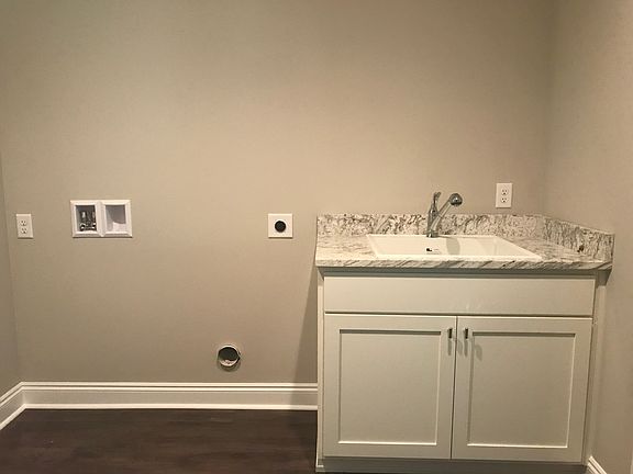 Laundry room. Granite top. 
