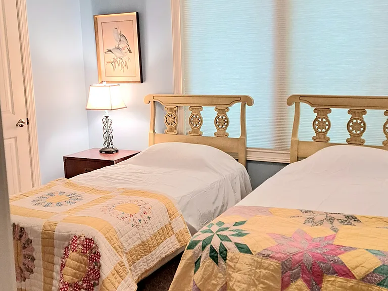 Large closet to left of beds
