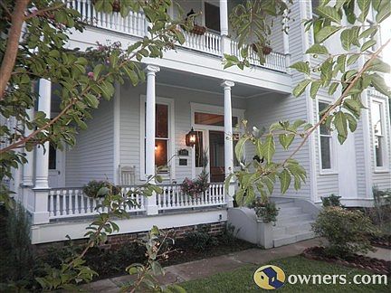 Peripheral view of front of house from ground level