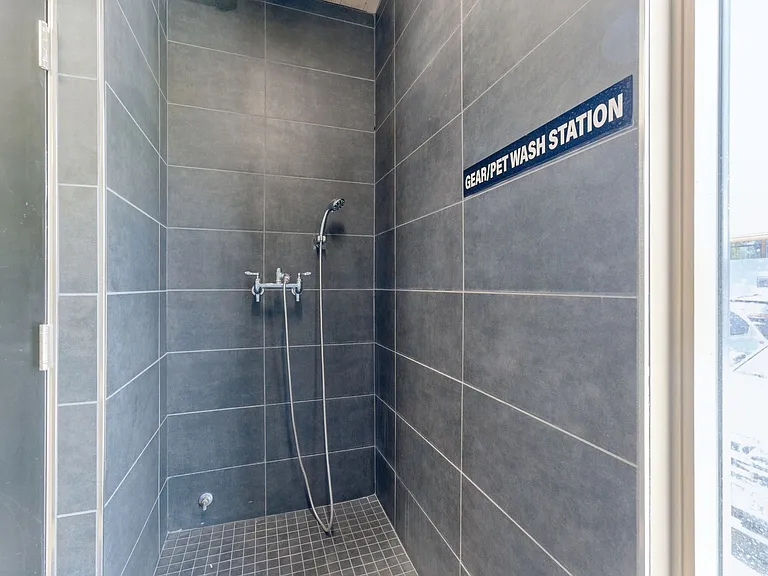Complimentary ski locker and gear/pet wash station.