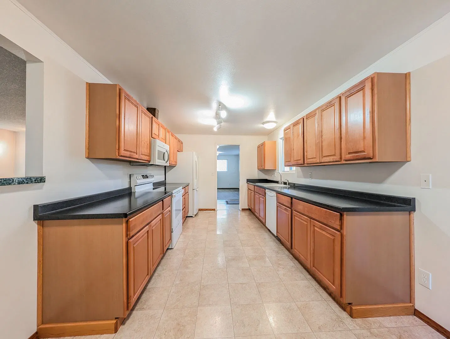 **Move-In Special**Spacious Single-Level Rambler with Fenced Yard, Bonus Room & Garage! — Photo 2