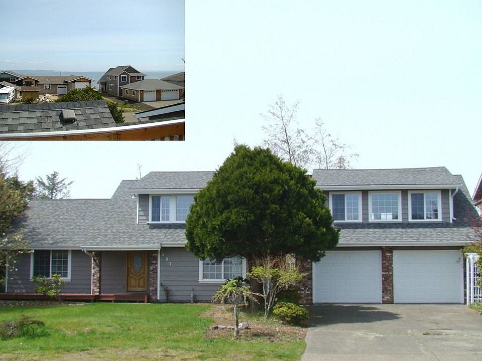 Front view of the house w/ view of the Bay.