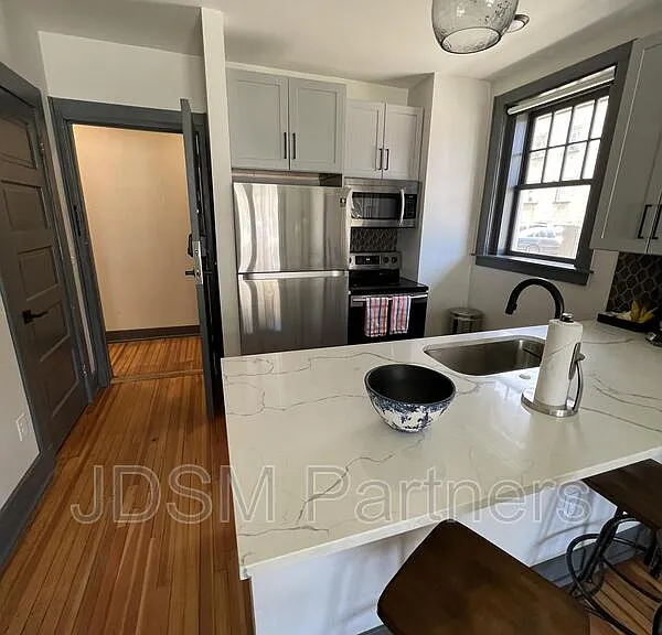 630 E 16th Ave #102 — Photo 3