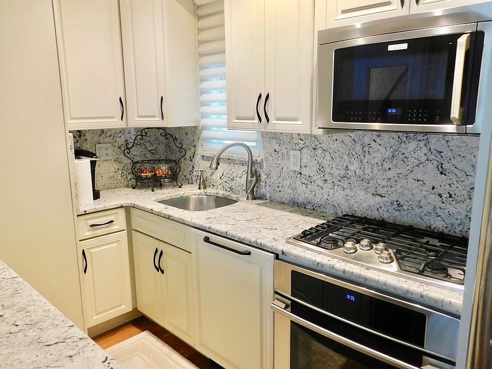 New Kitchen with granite and stainless steel appliances