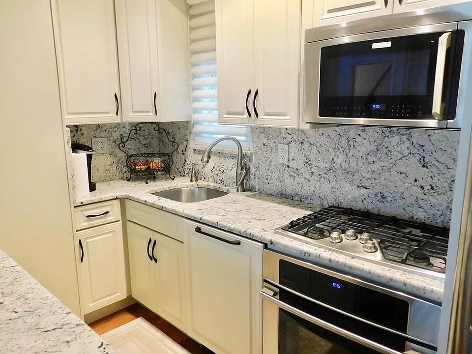 New Kitchen with granite and stainless steel appliances
