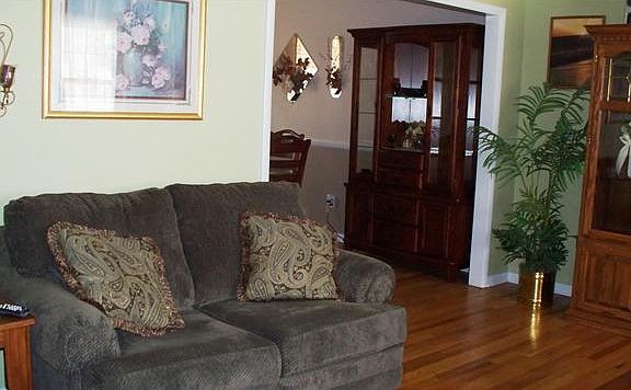 Gleaming solid hardwoods throughout main floor