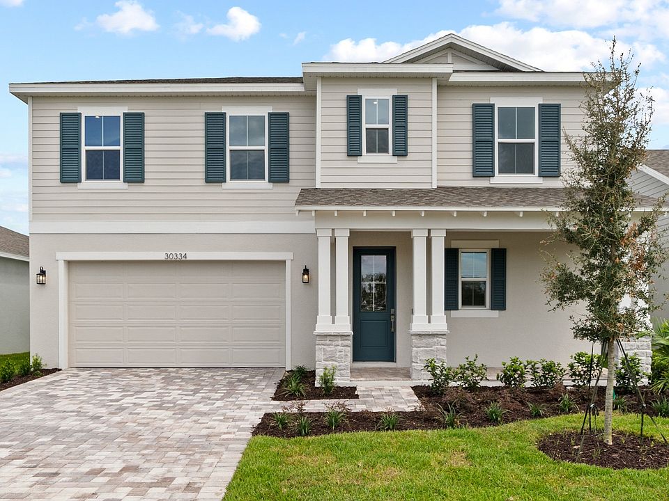 Mangrove Front Exterior by DRB Homes, New Homes in Saint Cloud, FL at Lakeside at Satilla