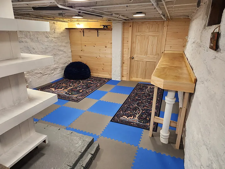 basement bonus space, perfect for storage or workshop (this room is not included in the sq. ft. calculations for the home)