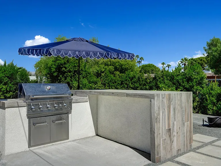 Outdoor kitchen area with BBQ inspired by the 1 hotel