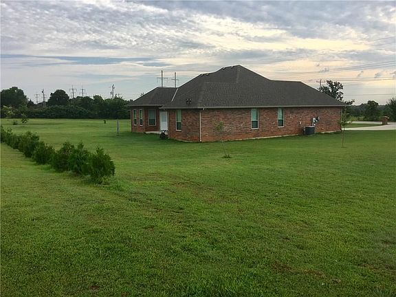 Want a Swimming Pool? Pick the spot and start digging. The house sits on 1.3 acres. View looking from the SW corner of property looking NE.
